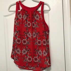 Red floral sleeveless blouse